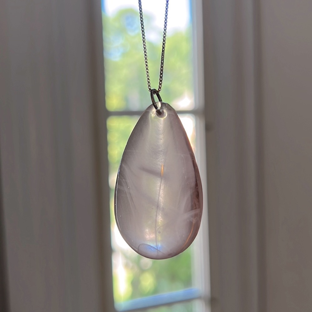 Light pink necklace with 12” chain.